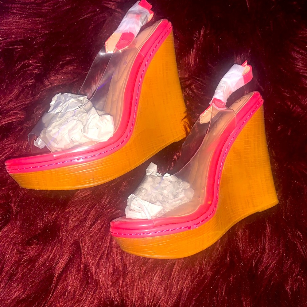 Hot pink see through wedged heels. Size 8 and 7